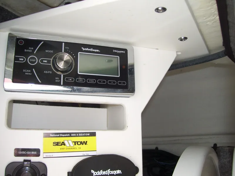 Slide: The Image of Rockford Fosgate stereo system in 2015 Sea Ray 240 Sundeck boat interior. - 11