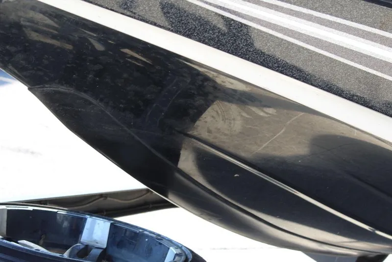 Slide: The Image of Close-up of 2018 Skeeter FX21 LE boat hull with sleek black finish. - 7