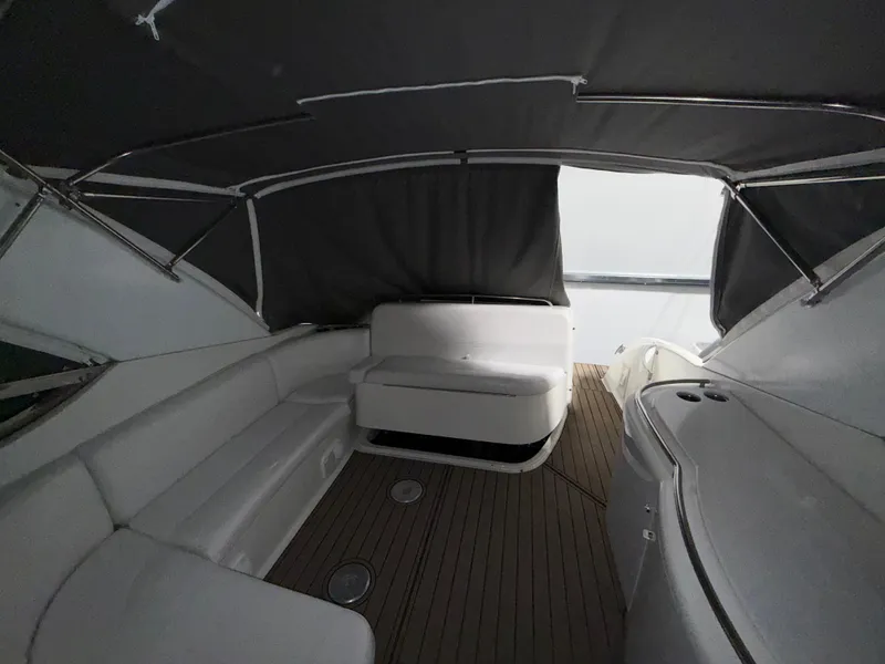 Slide: The Image of Interior of a 2003 Formula 400ss boat with seating and canopy. - 12