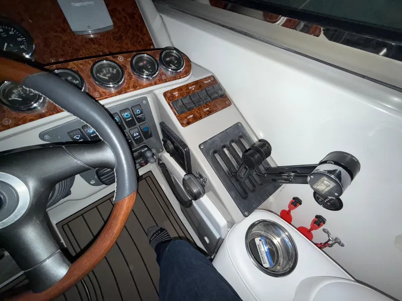 Slide: The Image of Dashboard of a 2003 Formula 400ss boat with steering wheel and control panel. - 15