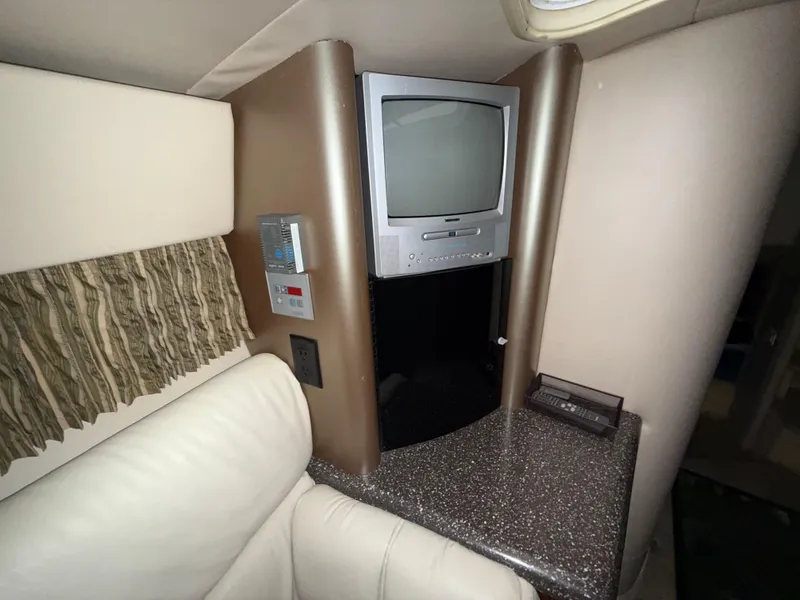 Slide: The Image of 2003 Formula 400ss cabin interior with TV and control panel. - 20