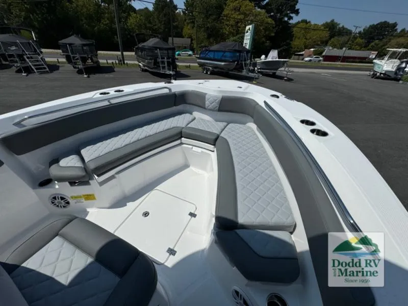 Slide: The Image of 2025 NauticStar 242 Offshore boat with spacious seating and modern design at Dodd RV Marine. - 17