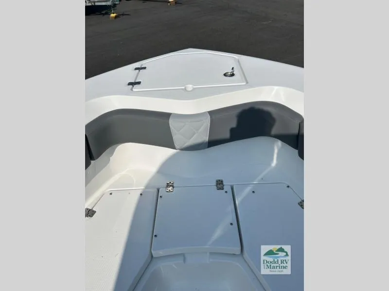 Slide: The Image of 2025 NauticStar 242 Offshore boat deck, featuring storage compartments and sleek design. - 6