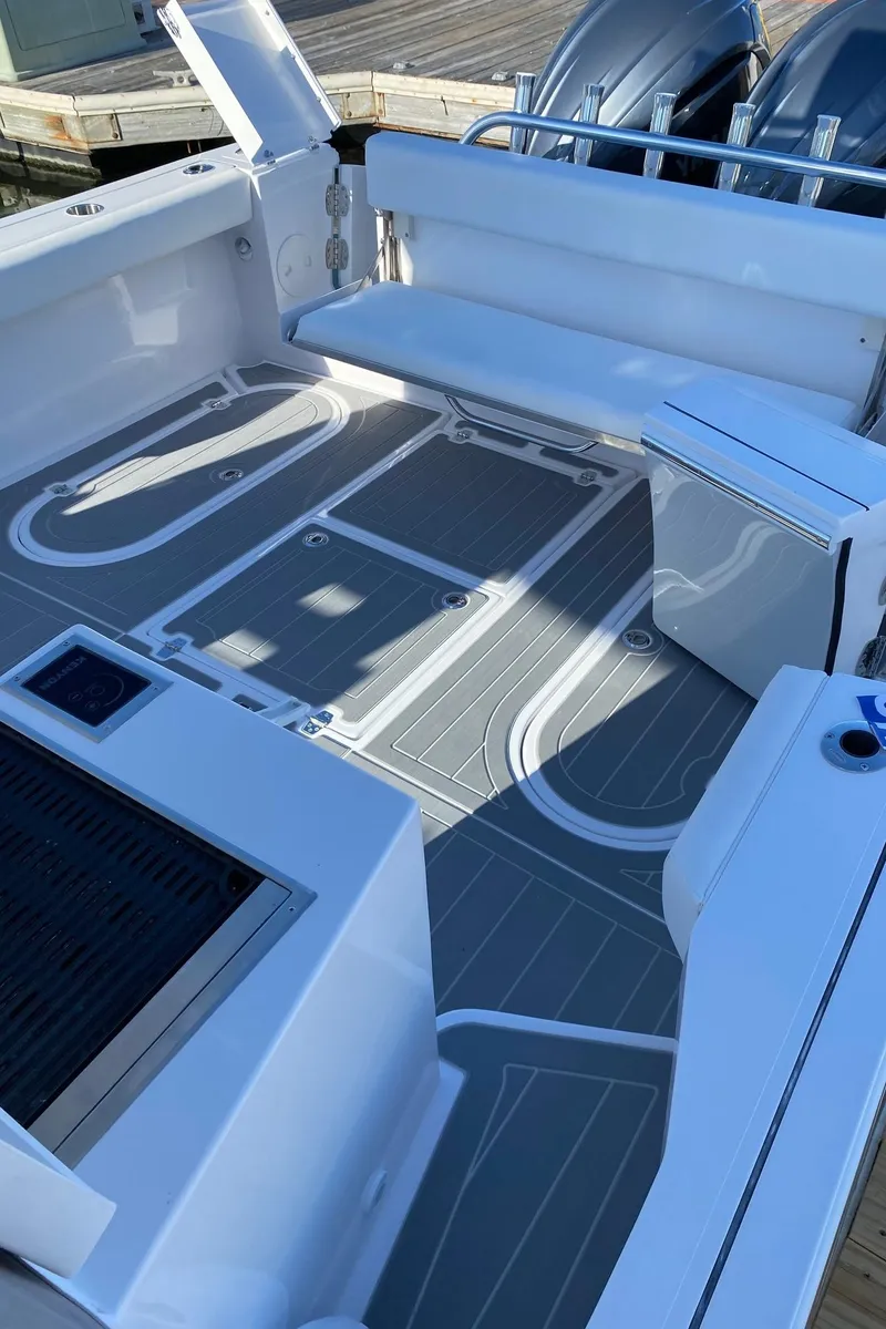 Slide: The Image of 2025 NorthCoast 315 HT boat interior with sleek seating and modern design. - 6
