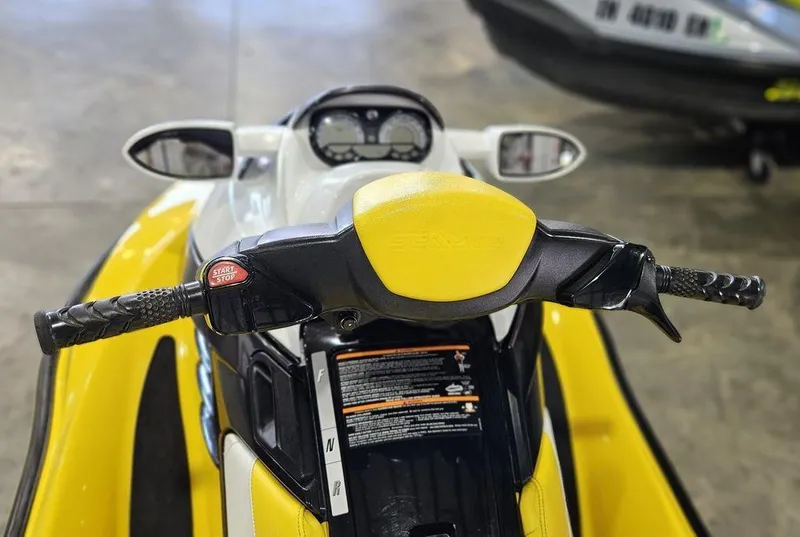 Slide: The Image of 2009 Sea-Doo RXT™ 215 jet ski, yellow and black, handlebar view. - 6