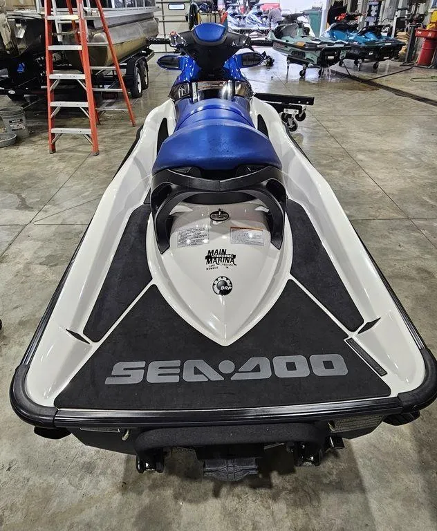 Slide: The Image of 2007 Sea-Doo GTX 4-TEC™ jet ski in a workshop setting. - 5