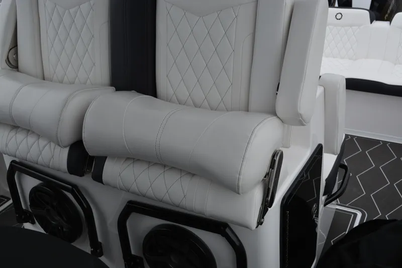Slide: The Image of Luxurious seating on 2025 Fountain 34 CC boat with diamond-stitched upholstery. - 15