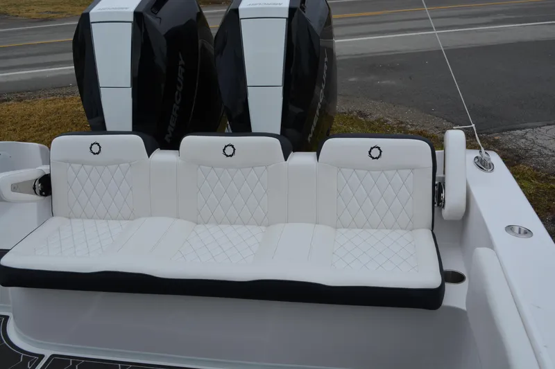 Slide: The Image of Luxury seating on 2025 Fountain 34 CC boat with dual Mercury engines. - 17
