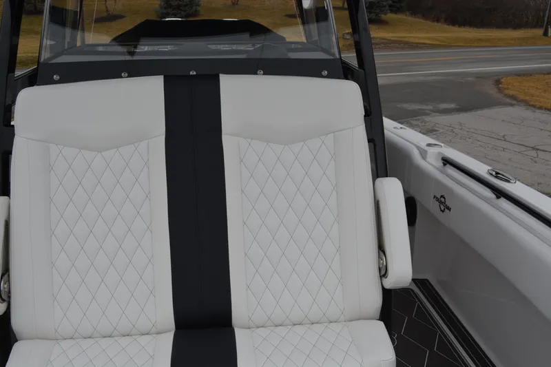 Slide: The Image of Luxury seating on 2025 Fountain 34 CC boat with diamond-stitched upholstery. - 21