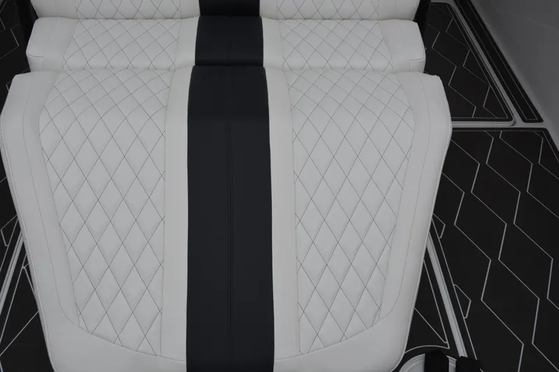 Slide: The Image of Luxurious seating on 2025 Fountain 34 CC boat with diamond-stitched upholstery. - 22