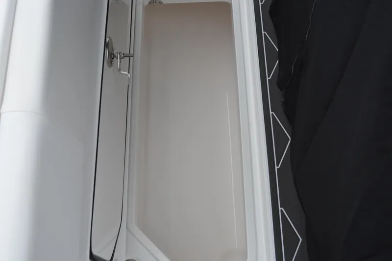 Slide: The Image of Storage compartment on a 2025 Fountain 34 CC boat, featuring sleek design and ample space. - 36