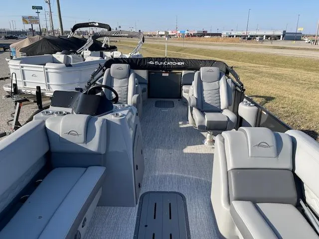 Slide: The Image of 2025 SunCatcher Fusion 324RC pontoon boat with spacious seating and modern design. - 13