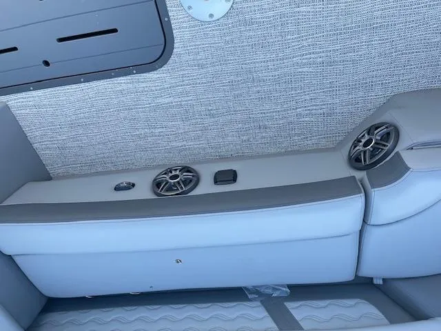 Slide: The Image of Interior seating of 2025 SunCatcher Fusion 324RC with built-in speakers. - 27