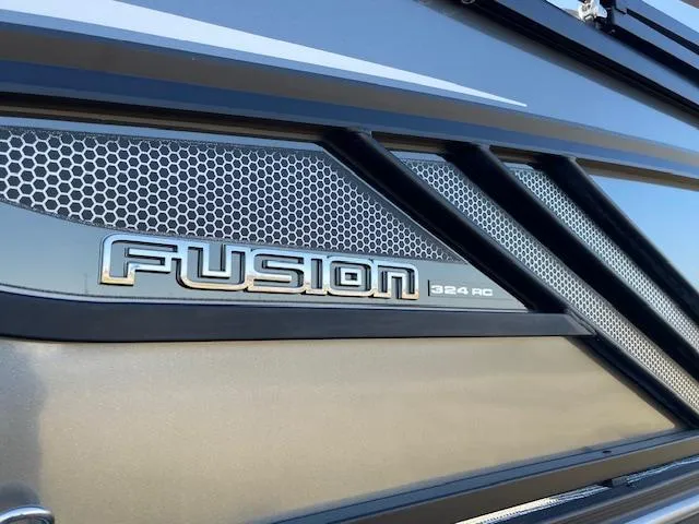 Slide: The Image of 2025 SunCatcher Fusion 324RC logo on sleek metallic surface with honeycomb design. - 5