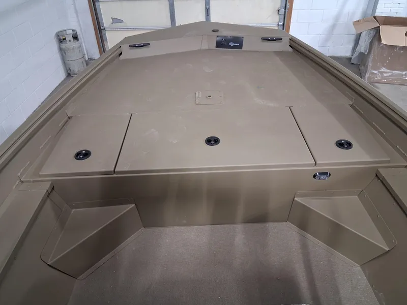 Slide: The Image of 2025 G3 Gator Tough 18 CC boat interior, featuring storage compartments and a durable design. - 7