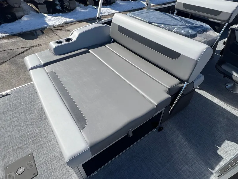 Slide: The Image of 2025 Princecraft Vectra 25 RL boat seating with gray upholstery and cup holders. - 3
