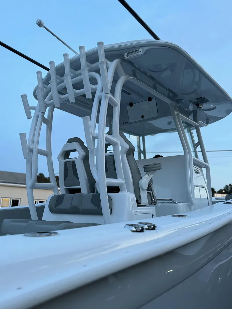 Slide: The Image of 2025 Cape Horn 32 XS boat, sleek design, advanced features, and spacious seating. - 14