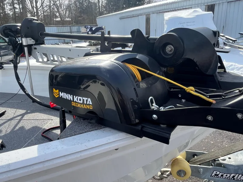Slide: The Image of Minn Kota Deckhand on 2020 Crestliner 1800 Kodiak SC boat, docked outdoors. - 5