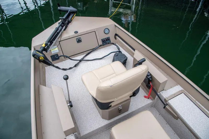 Slide: The Image of 2025 SeaArk 1652 Crappie boat with Tohatsu 25 HP outboard motor. - 3