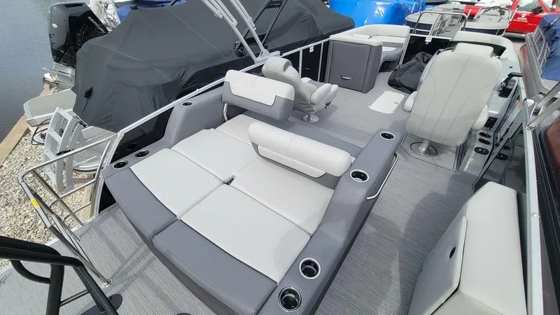 Slide: The Image of Luxurious 2025 Godfrey Monaco 235 DFL boat interior with plush seating and modern design. - 7