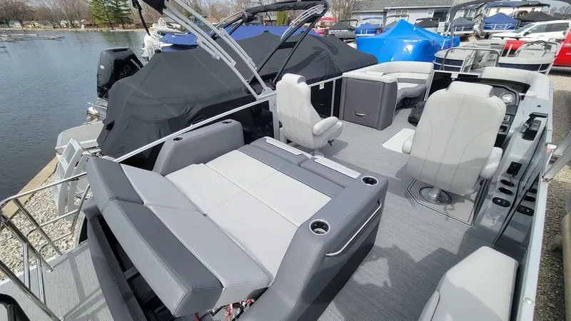 Slide: The Image of 2025 Godfrey Monaco 235 DFL boat with spacious seating and modern design. - 8