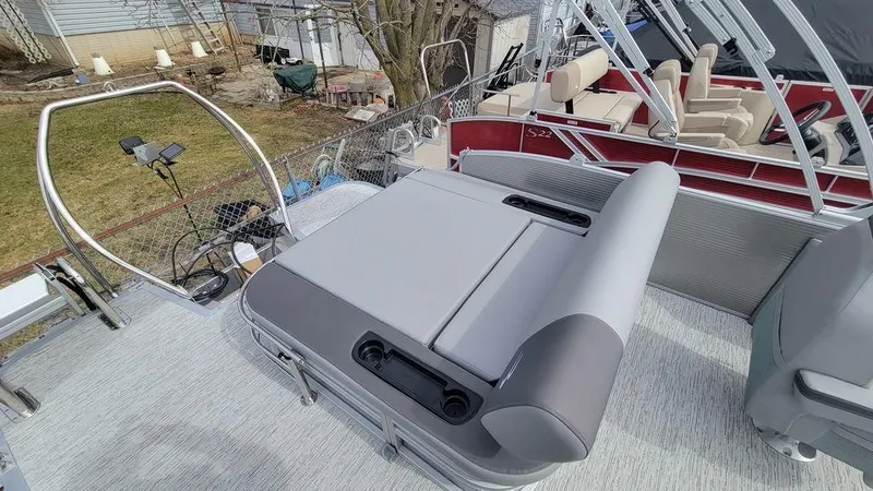 Slide: The Image of 2025 Bennington S Swingback 22 SSB pontoon boat with sleek seating and modern design. - 4