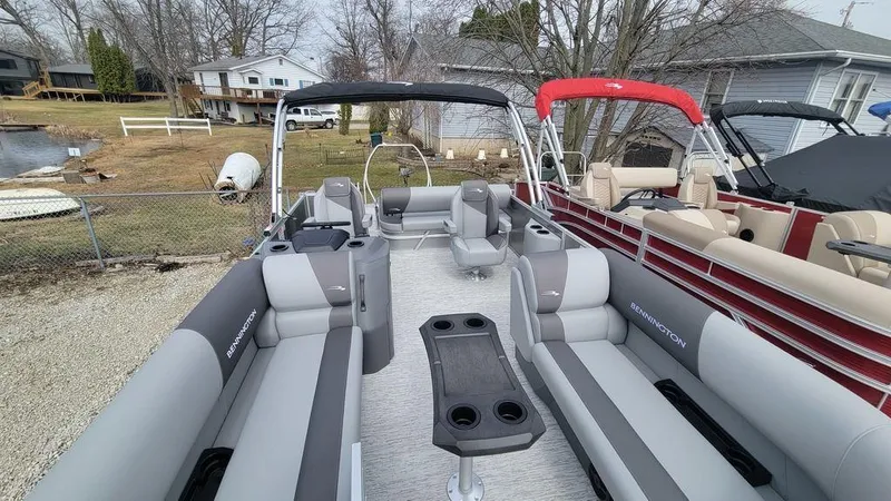 Slide: The Image of 2025 Bennington S Swingback 22 SSB pontoon boat with spacious seating and modern design. - 8