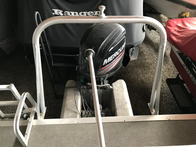 Slide: The Image of 2017 Sun Tracker Party Barge 22 DLX with Mercury outboard motor, docked. - 10