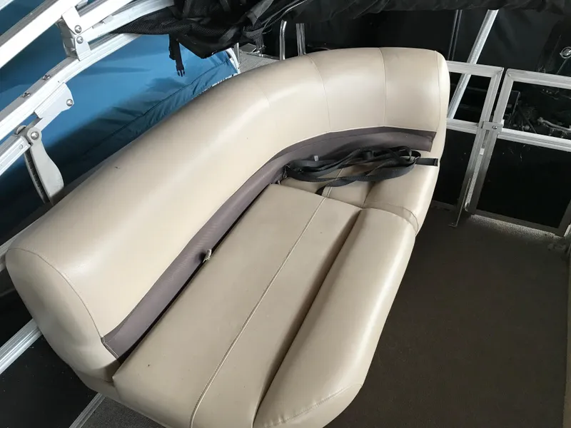 Slide: The Image of 2017 Sun Tracker Party Barge 22 DLX beige seating area with seatbelt. - 14