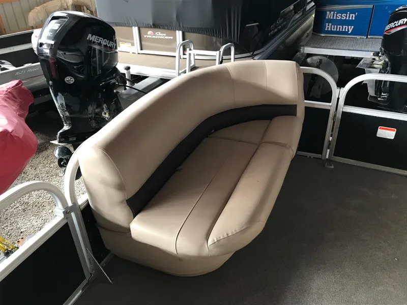 Slide: The Image of 2017 Sun Tracker Party Barge 22 DLX with beige seating and Mercury outboard motor. - 18