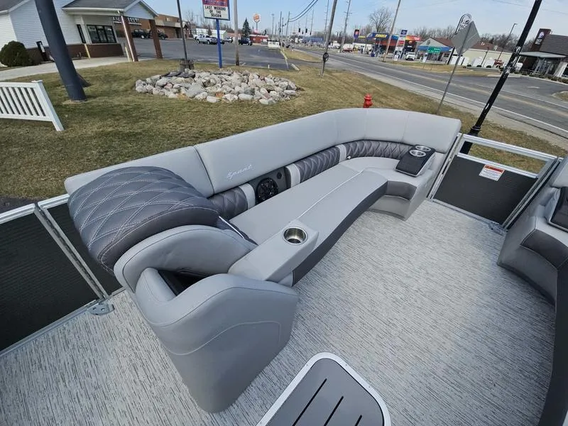 Slide: The Image of 2025 Bennington R Swingback 25 RSB pontoon boat with luxurious seating and modern design. - 16