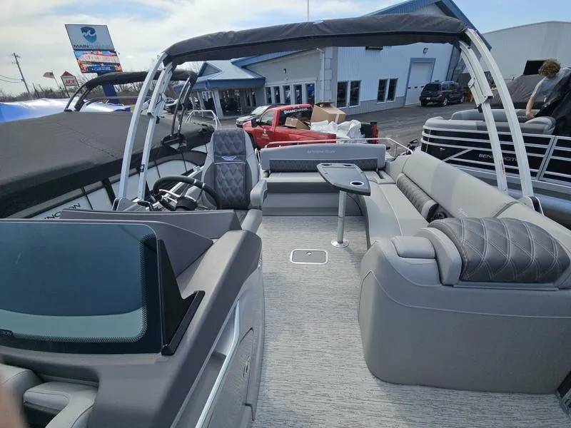 Slide: The Image of 2025 Bennington R Swingback 25 RSB pontoon boat with spacious seating and modern design. - 4