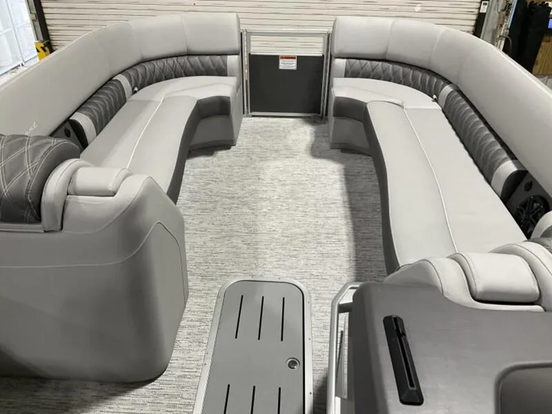 Slide: The Image of 2025 Bennington R Swingback 25 RSB pontoon boat interior with luxurious seating. - 5