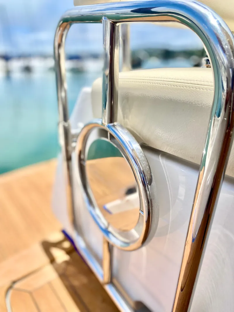 Slide: The Image of Close-up of 2007 Chris-Craft Roamer 40 yacht's polished metal railing detail. - 12