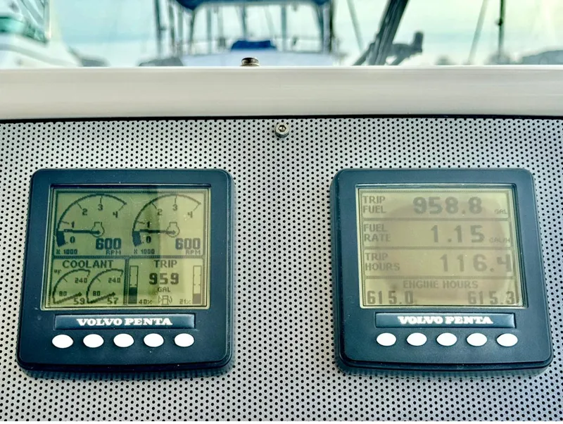 Slide: The Image of Digital gauges on a 2007 Chris-Craft Roamer 40 boat dashboard displaying engine data. - 28