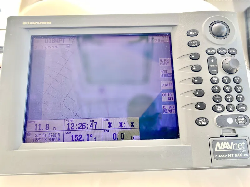 Slide: The Image of Furuno navigation system on 2007 Chris-Craft Roamer 40 yacht, displaying depth and coordinates. - 29