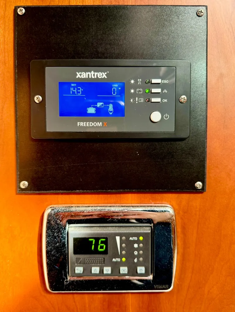 Slide: The Image of Xantrex Freedom X control panel and thermostat on 2007 Chris-Craft Roamer 40 yacht. - 50
