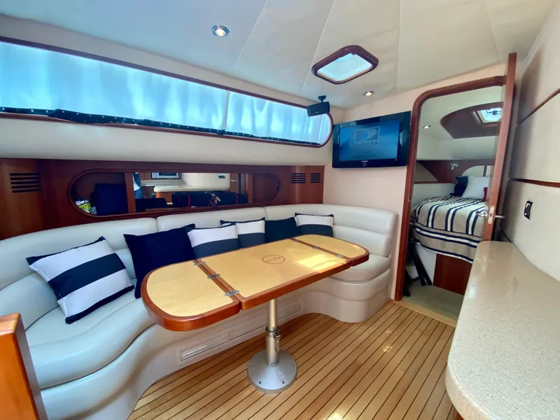 Slide: The Image of Luxurious interior of 2007 Chris-Craft Roamer 40 yacht with elegant seating and modern amenities. - 51