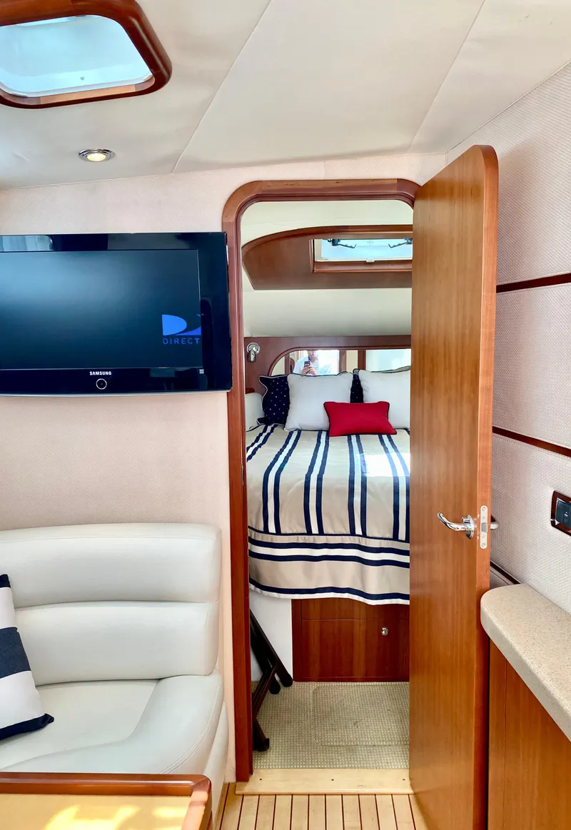 Slide: The Image of Interior of 2007 Chris-Craft Roamer 40 yacht with cozy cabin and modern amenities. - 52