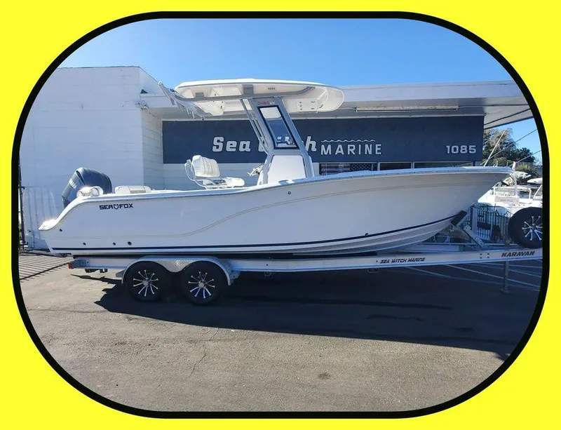 Slide: The Image of 2025 Sea Fox 248 Commander boat on trailer at Sea Witch Marine dealership. - 1