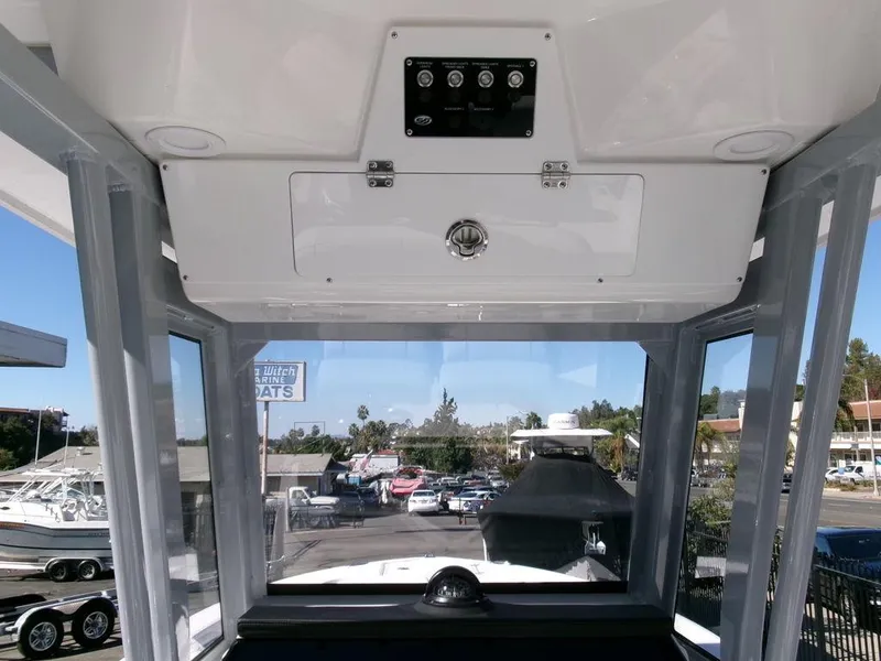 Slide: The Image of Interior view of 2025 Sea Fox 248 Commander boat, showcasing dashboard and controls. - 21
