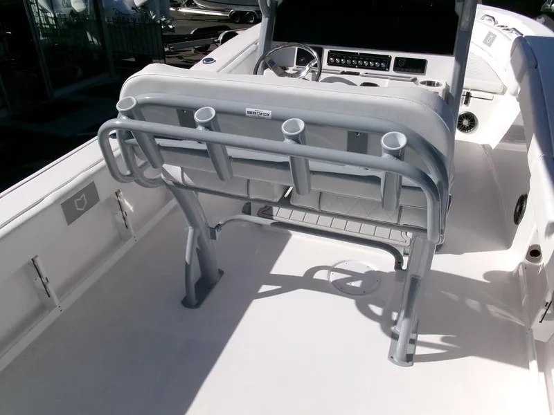 Slide: The Image of 2025 Sea Fox 248 Commander boat interior with seating and console. - 26