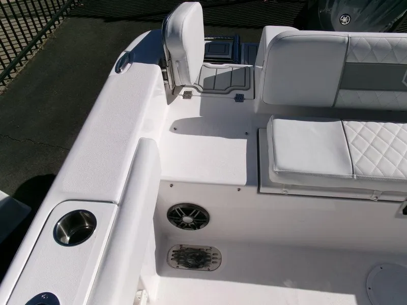 Slide: The Image of 2025 Sea Fox 248 Commander boat interior with white seating and cup holders. - 31