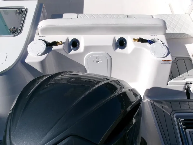 Slide: The Image of 2025 Sea Fox 248 Commander boat engine and control panel close-up. - 33