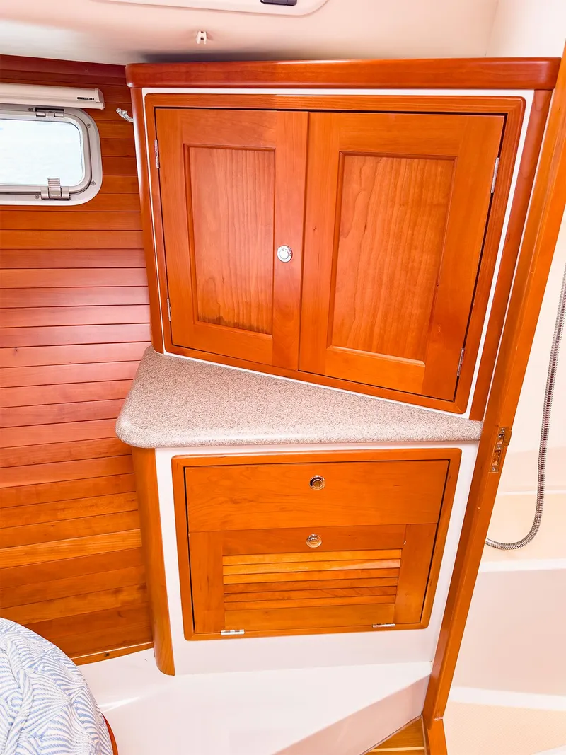 Slide: The Image of 2012 MJM 40z Downeast yacht interior with wooden cabinets and countertop. - 35