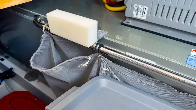 Slide: The Image of 2012 MJM 40z Downeast boat interior with storage compartment and equipment. - 40