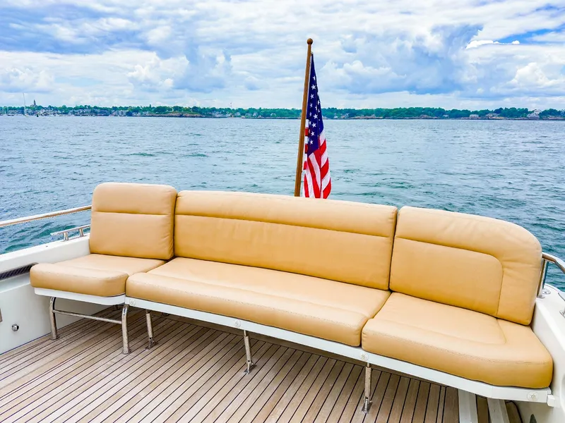 Slide: The Image of Luxury seating on 2012 MJM 40z Downeast yacht with American flag and ocean view. - 8
