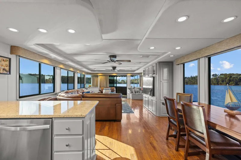 Slide: The Image of Luxurious kitchen in 1998 Stardust Cruisers houseboat with modern appliances and elegant cabinetry. - 40