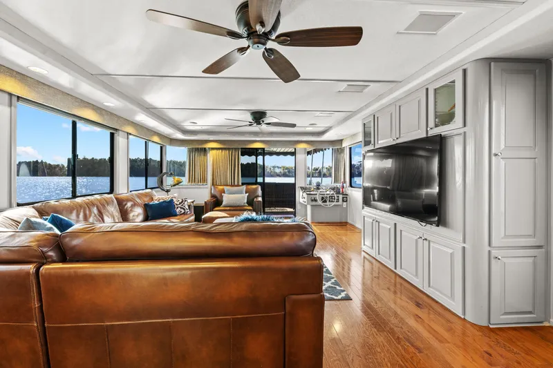 Slide: The Image of Luxurious kitchen interior of 1998 Stardust Cruisers houseboat with modern appliances and lake view. - 42