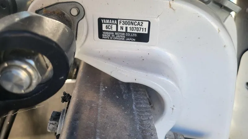 Slide: The Image of Close-up of Yamaha F300NCA2 engine part on 2020 Bennington 24 RTFBC boat. - 11